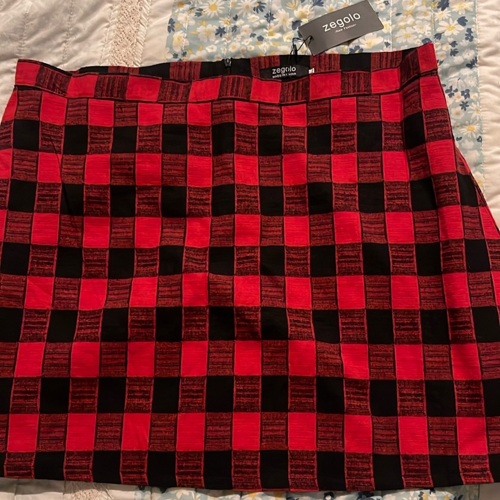 Brand new skirt great for holidays. Short skirt bright colors red and black.